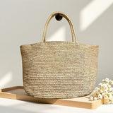 Handwoven raffia beach tote interior – structured woven straw bag with reinforced handles
