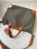Recycled nylon cowhide tote open showing organised interior – laptop slip and zip pocket