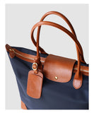 Handmade recycled nylon tote with self-healing crease recovery material – commuter laptop bag