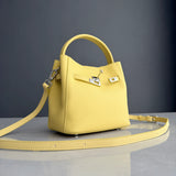 Luxury Pebbled Cowhide Leather Bucket Bag, Designer Crossbody with Twist Lock