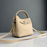 Luxury Pebbled Cowhide Leather Bucket Bag, Designer Crossbody with Twist Lock