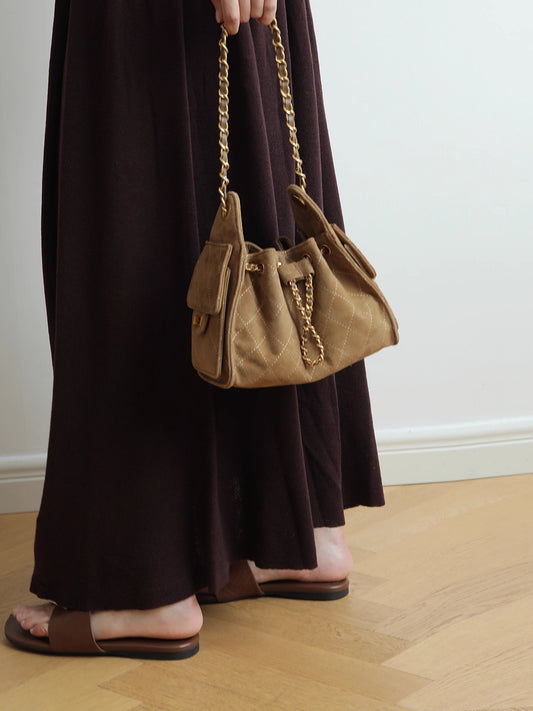 Quilted Suede Lambskin Drawstring Bucket Bag – Gold Chain Shoulder Bag | Diamond Quilt with Side Flap Pockets & Turn-Lock Clasp