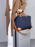 Engineered leather corner reinforcement on recycled nylon work tote – stress point protection