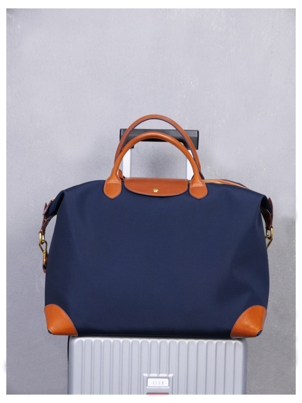 Anti-slip rubber-backed shoulder strap detail on handmade nylon cowhide commuter tote