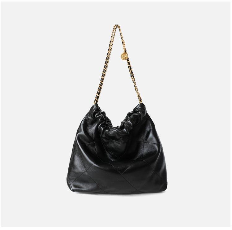 Large black calfskin leather shoulder bag with a gold-tone chain strap and minimalist quilted design