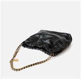Large black quilted calfskin leather shoulder bag with gold-tone chain strap on white background