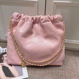 Large pink quilted leather shoulder bag with gold-tone chain strap, minimalist tote style.