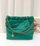Large green quilted leather shoulder bag with gold-tone chain strap and floral medallion charm