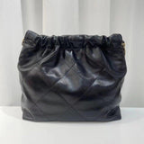 Large black quilted calfskin leather shoulder bag with gold-tone chain on white background