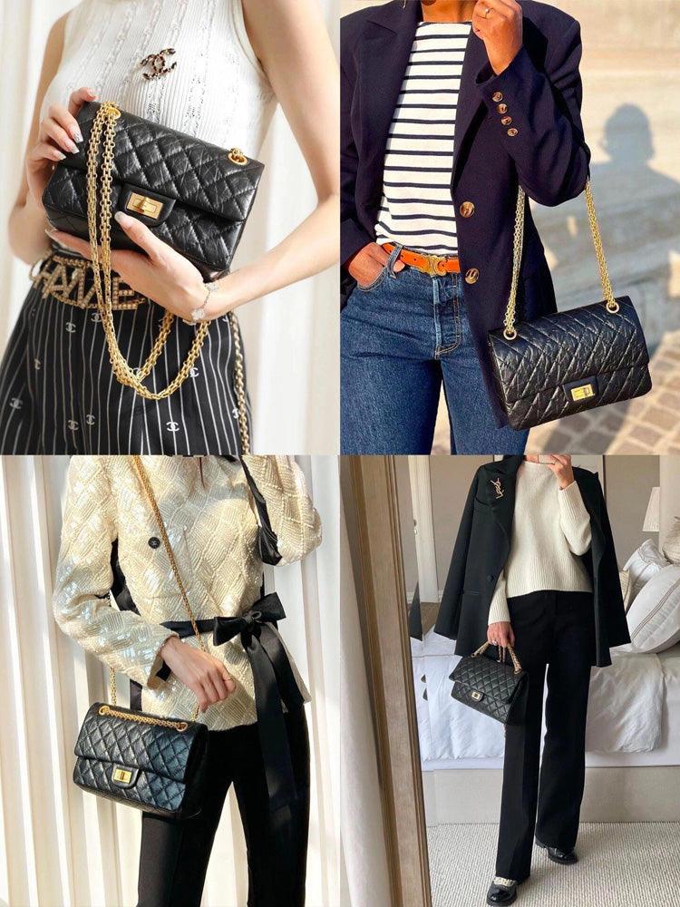 Woman in white shirt carrying black quilted leather shoulder bag with gold chain strap