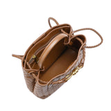 Brown woven cowhide leather shoulder bag with open top, gold buckle, and zip compartment
