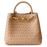 Beige woven leather shoulder bag with gold metal buckle and double handles