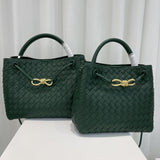 Green woven leather shoulder bags with gold metal buckle, displayed on a white surface.