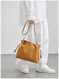 Elegant Oversized Cowhide Leather Tote Bag for Women with Drawstring Closure