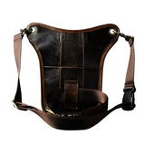 Full grain dark brown leather leg bag with zipper pockets and metal rivet details