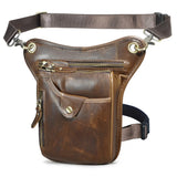 Full grain dark brown leather leg bag with zipper pockets and metal rivet details