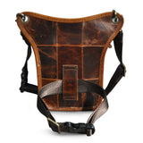 Full grain leather leg bag for men, worn at the waist, with zipper pockets, outdoor setting Red Brown