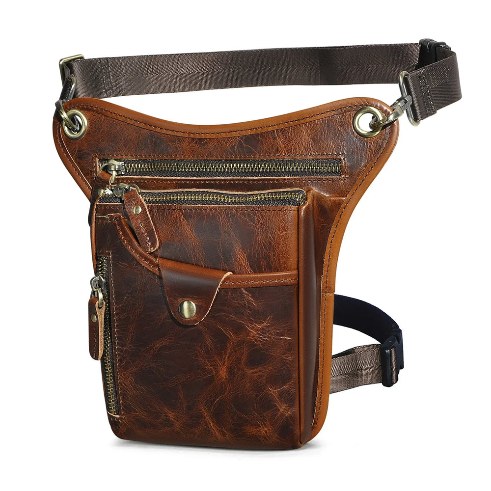 Full grain leather leg bag for men, worn at the waist, with zipper pockets, outdoor setting Red Brown