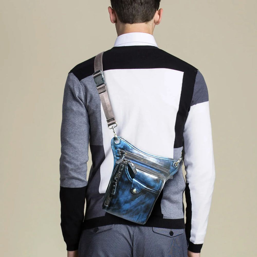 Full grain leather blue leg bag with zippered pockets and adjustable straps