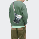 Full grain black leather leg bag with zip pockets and adjustable waist strap for men or women