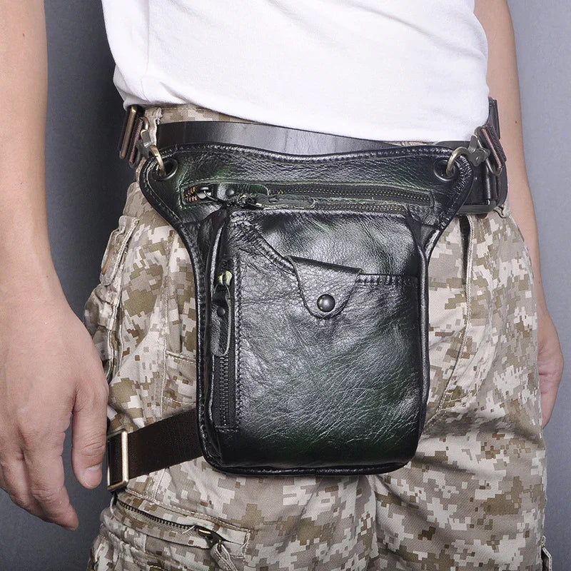 Full grain leather leg bag for men, black, with zip and snap pockets, worn crossbody