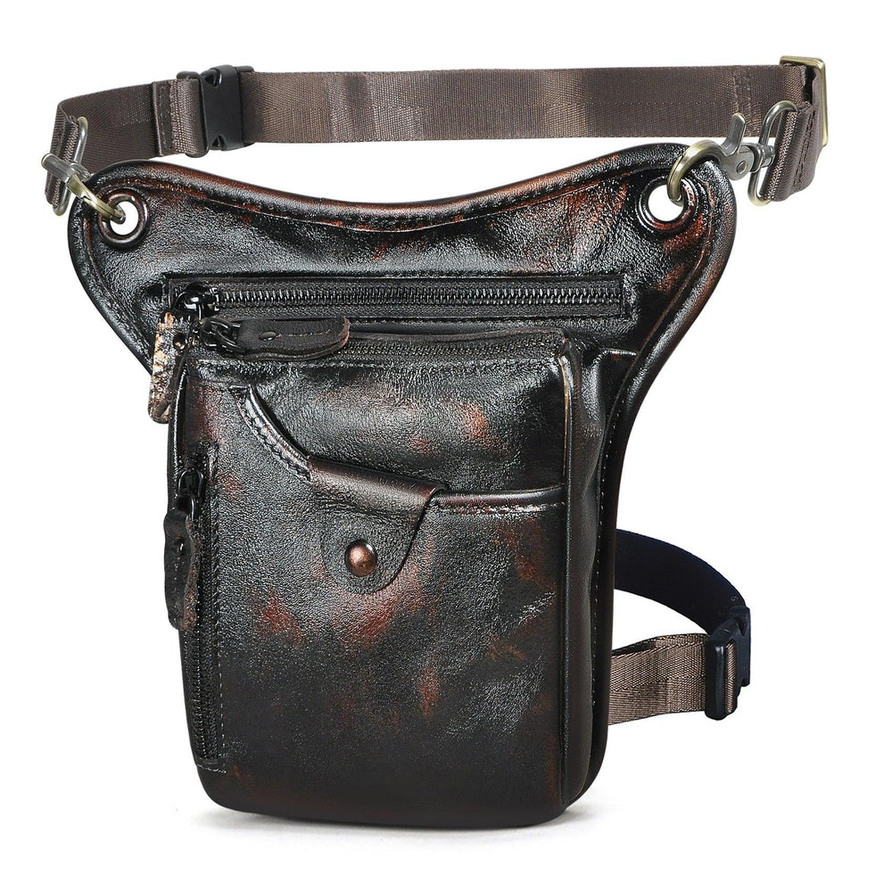 Full grain leather leg bag with front zipper and snap pocket, adjustable straps, dark brown finish.