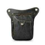 Full grain leather leg bag with zippered pockets and brass snap closures, motorcycle waist pouch dark grey