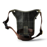 Full grain leather leg bag with zippered pockets and brass snap closures, motorcycle waist pouch dark grey