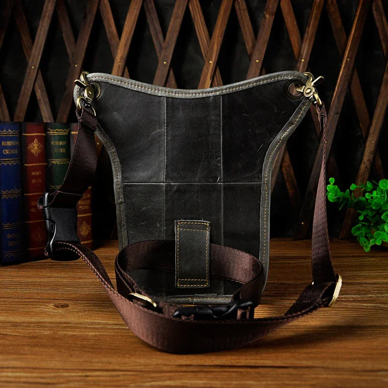 Full grain leather leg bag with zippered pockets and brass snap closures, motorcycle waist pouch dark grey