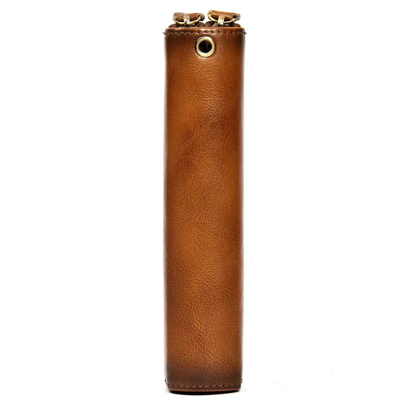 Side view of tall brown full grain leather long wallet with zipper and grommet detail