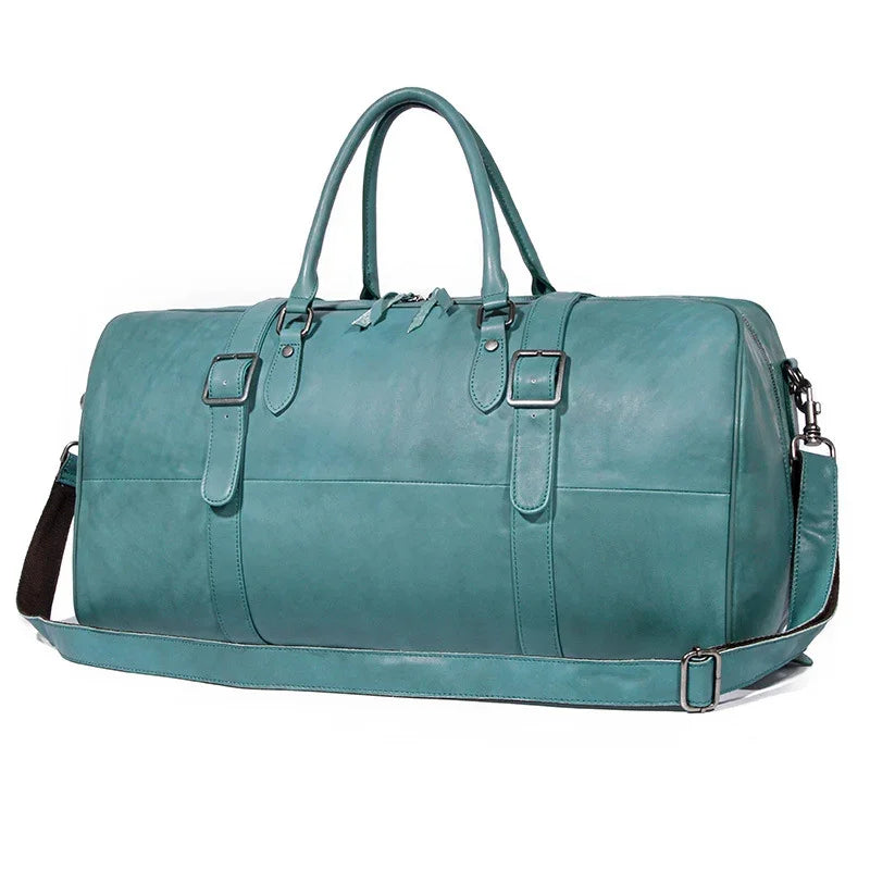 Teal full grain leather duffle bag with handles and adjustable shoulder strap for travel