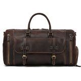 Handmade dark brown full-grain leather duffle bag with shoe compartment and gold zippers