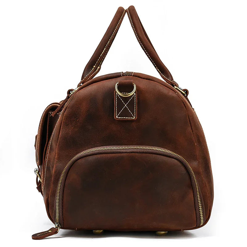 Handmade full grain leather duffle bag in dark brown with front zipper pocket and double handles