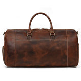 Handmade full grain leather duffle bag in dark brown with top handles and shoe compartment