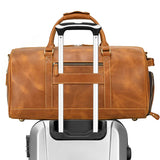 Handmade full grain leather duffle bag in brown with shoe compartment on suitcase