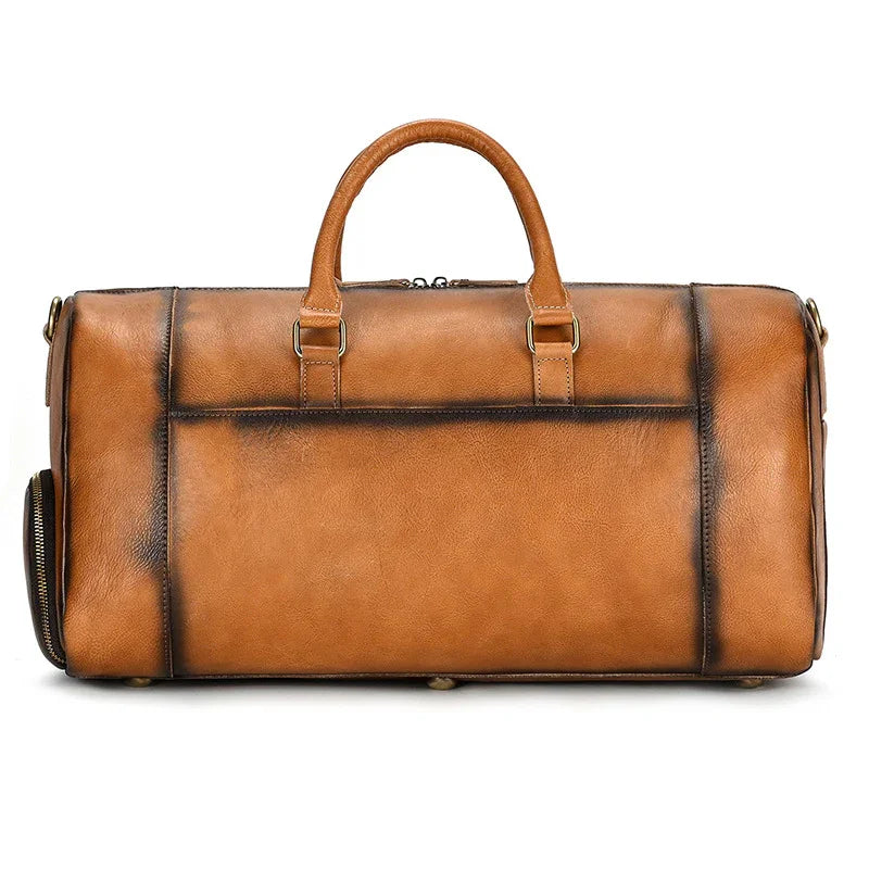 Handmade full grain leather duffle bag in dark brown with handles and shoe compartment