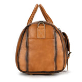 Handmade full grain leather duffle bag in dark brown with shoe compartment, side view