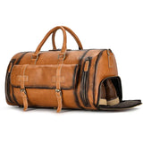 Handmade full-grain leather duffle bag in dark brown with shoe compartment and zippered pockets