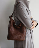 Handwoven full-grain leather bucket bag – artisan woven vegetable-tanned leather shoulder bag