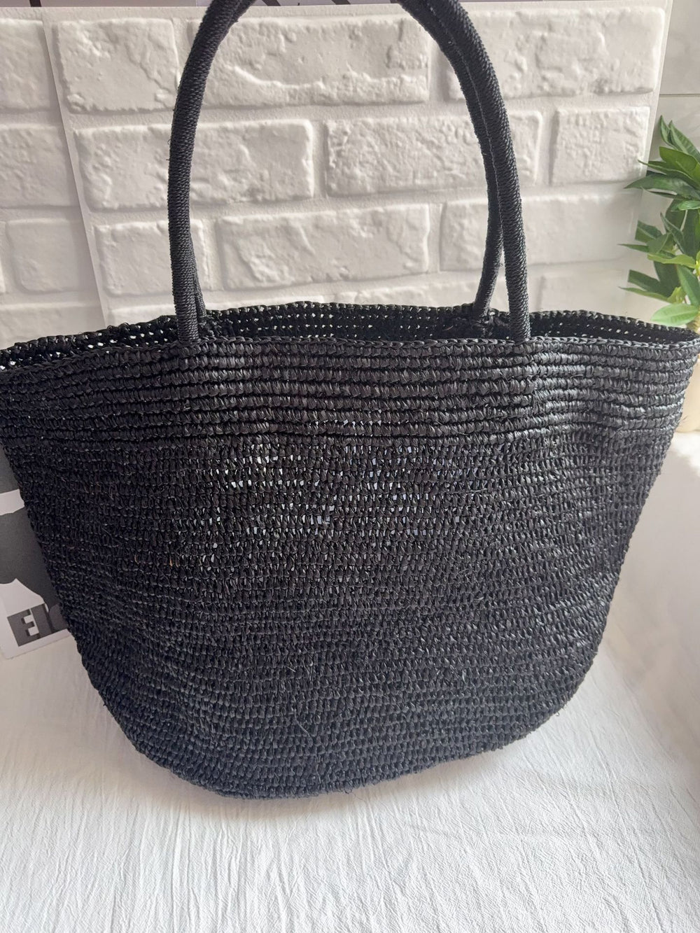 Handwoven raffia tote bag in green – large eco-friendly natural straw beach and market bag
