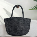 Handwoven raffia beach tote in natural colour – large woven straw bag for resort and vacation