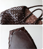 Closeup of dark brown Italian full grain leather woven hobo bag with braided handles