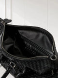 Black lambskin leather tote bag with woven intrecciato design and spacious zippered interior