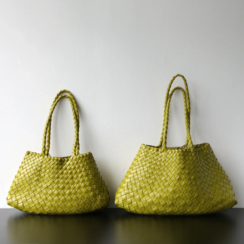 Two olive green woven leather hobo shoulder bags with long handles