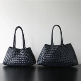 Two black woven leather hobo shoulder bags with long handles Navy