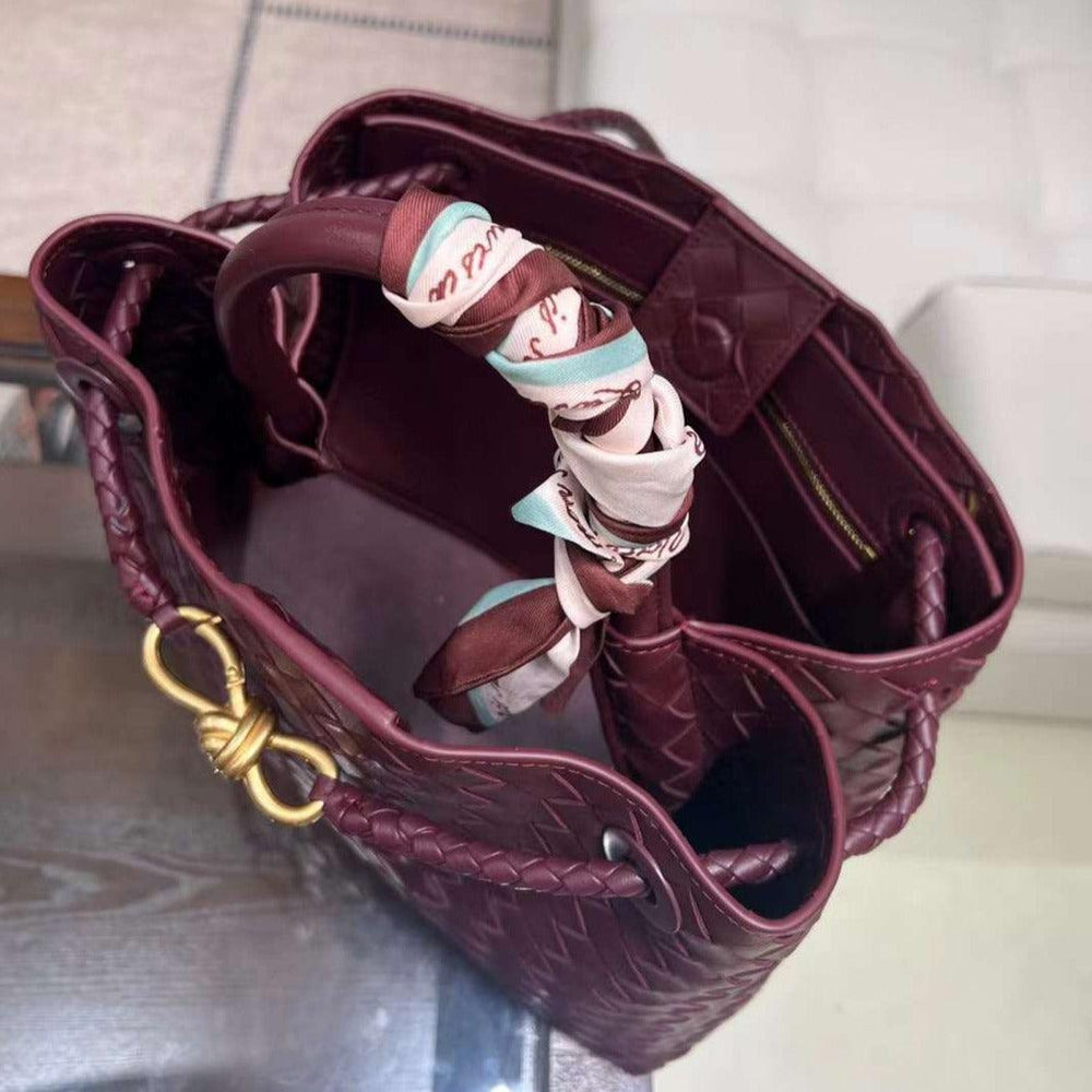 Burgundy lambskin woven leather shoulder bag with gold buckle and knotted handle scarf