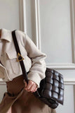 Small quilted lambskin leather shoulder bag with wide strap and geometric buckle