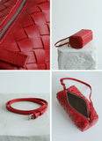 Red woven lambskin leather mini Boston bag with zipper closure and adjustable crossbody strap