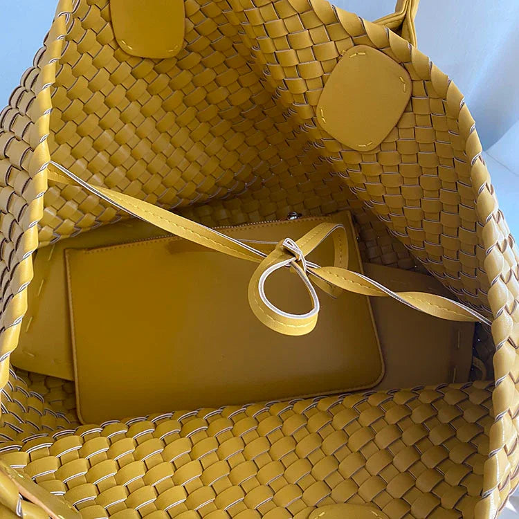 Interior of large yellow handwoven vegan leather tote bag with matching pouch