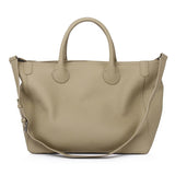 Large beige cowhide leather tote bag with shoulder strap and top handles on white background